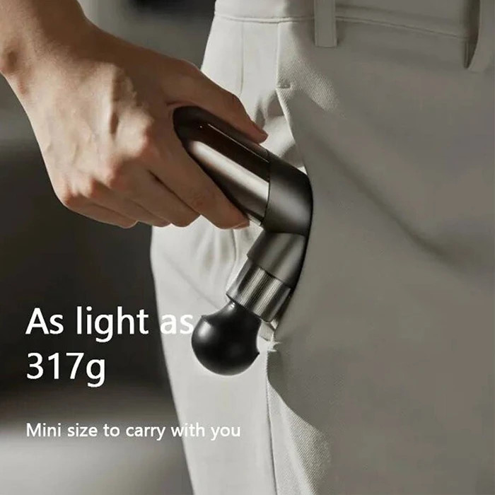 استفاده از ماساژور تفنگی فیلیپس روی عضلات پا